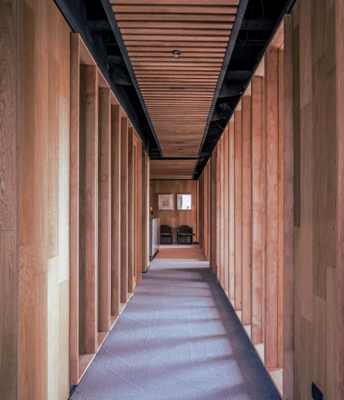 Wood-panelled corridor at the firm's offices