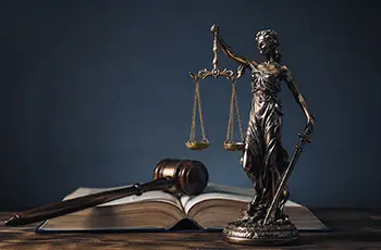 Scales of justice, gavel and law book