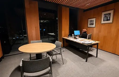 Attorney at work in the firm's Santiago office at night