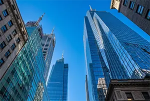 Glass office towers seen from below
